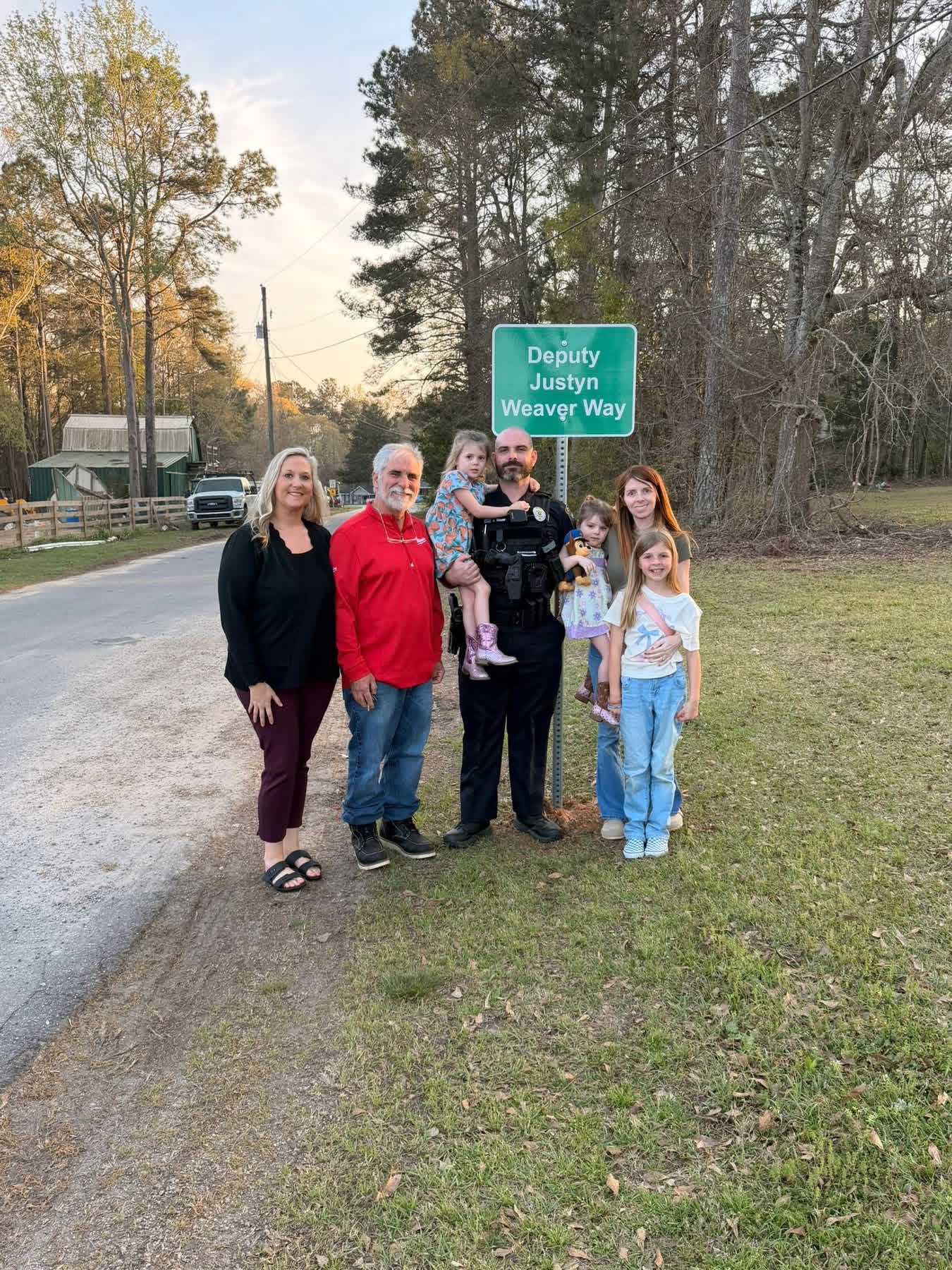 Justyn Weaver with family at Deputy Justyn Weaver Way